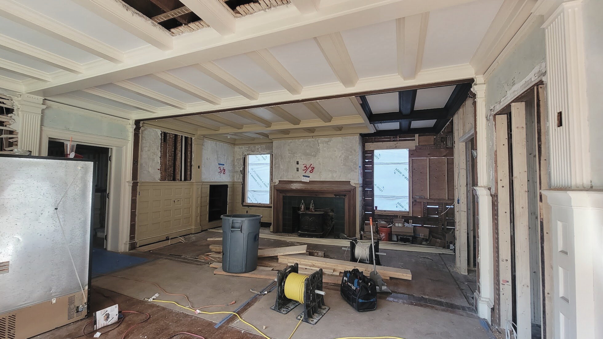 A room opened up with ceiling beams exposed